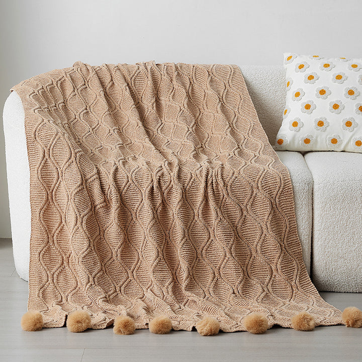 Ladies knit blanket with decorative pom poms Kalsten