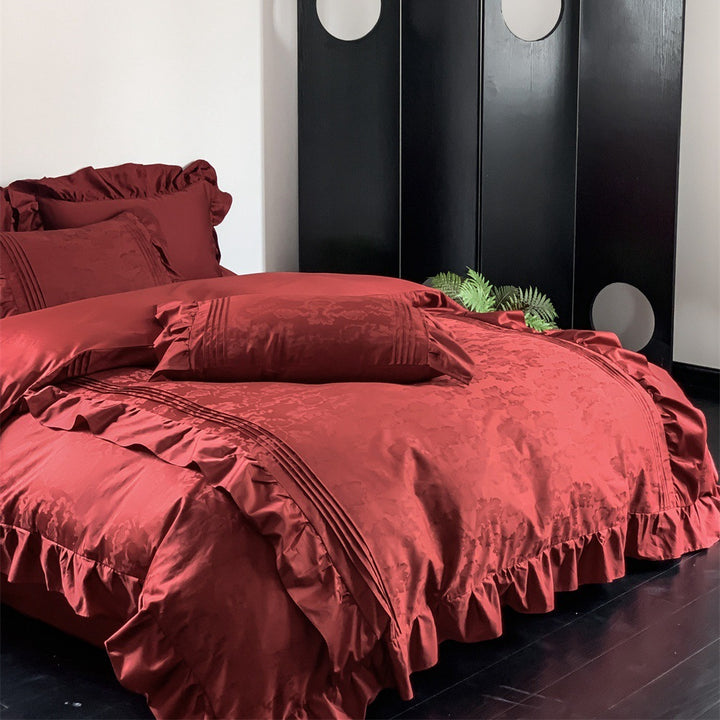 Elegant satin bedding set with ruffles, fine piping and jacquard relief