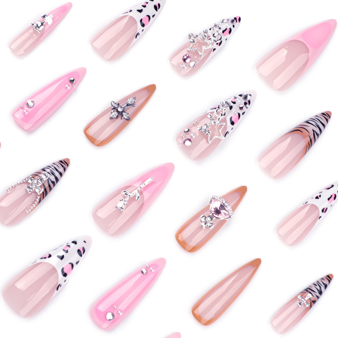 Artful stiletto nails with glitter and rhinestone embellishments Kalsten