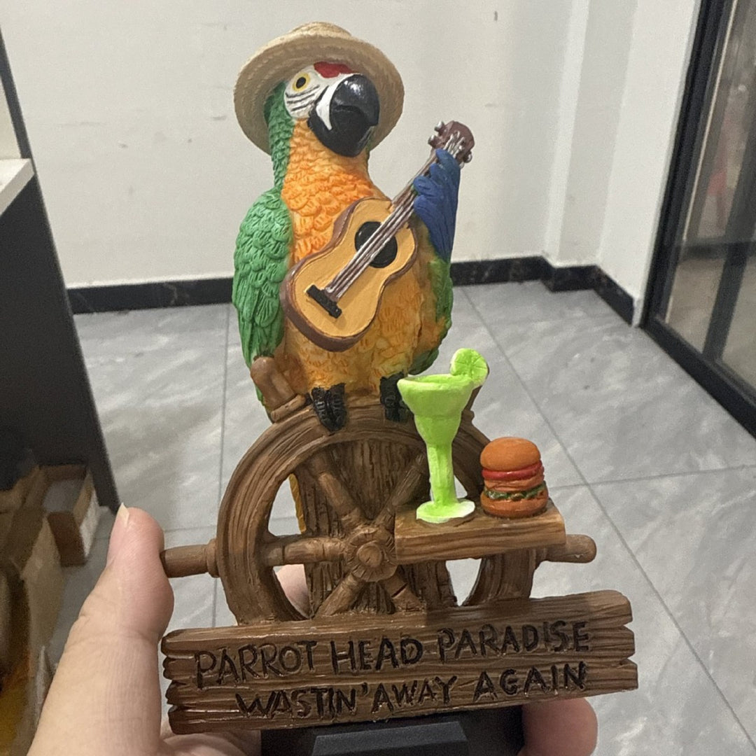 Decorative figure of a funny parrot with drink and guitar Kalsten