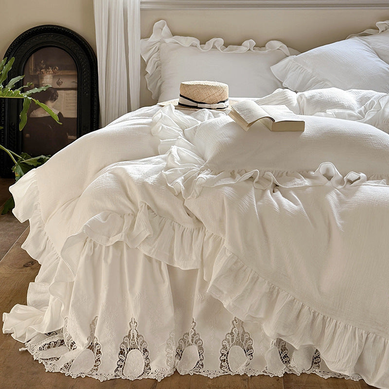 Romantic bedding set with voluminous ruffle, lace bed skirt, and double-layered frills