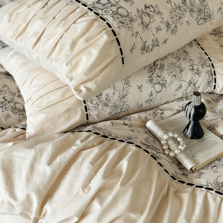 Romantic cotton percale bedding set with fine toile print and ruffle trim