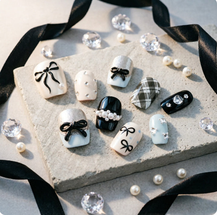 Artificial nails with elegant bows and rhinestones Kalsten