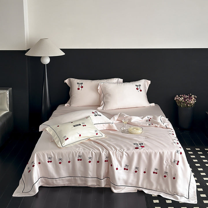 Cotton satin bedding set with cherry embroidery and contrasting piping
