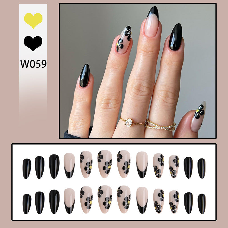 Elegant nail tips with floral accents Kalsten