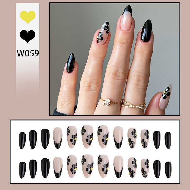 Elegant nail tips with floral accents Kalsten