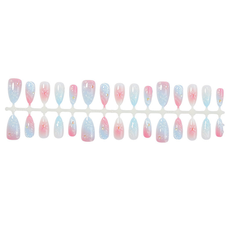 Acrylic nail set with elegant ombre design and floral decorations Kalsten