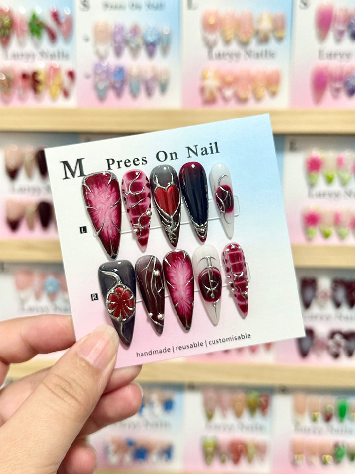 Artistic Press-On Nail Set with Floral and Green Accents