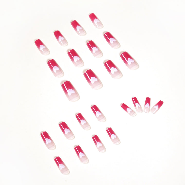 Artful nail extensions in romantic heart design Kalsten