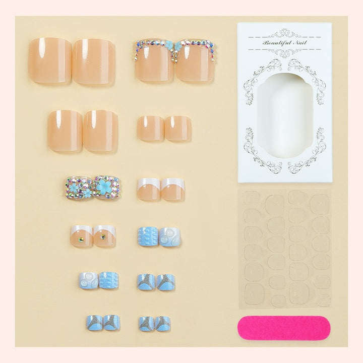 Glamorous artificial nail creation with elegant embellishments Kalsten