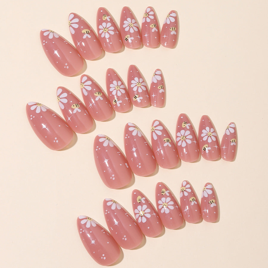 Artificial nails set with elegant flowers and glitter accents Kalsten