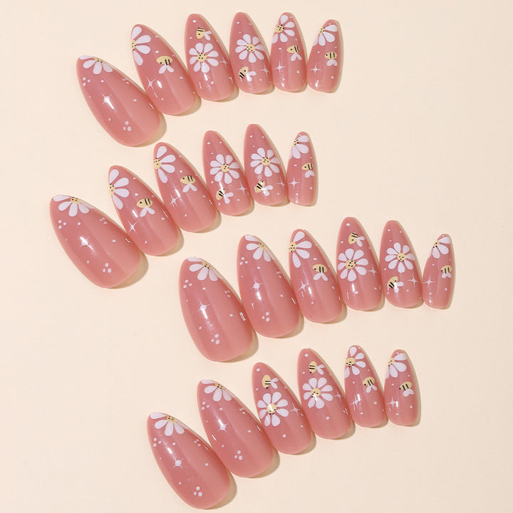 Artificial nails set with elegant flowers and glitter accents Kalsten