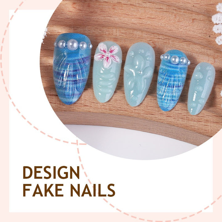 Nail art set with unique aquatic motifs and decorative accents Kalsten