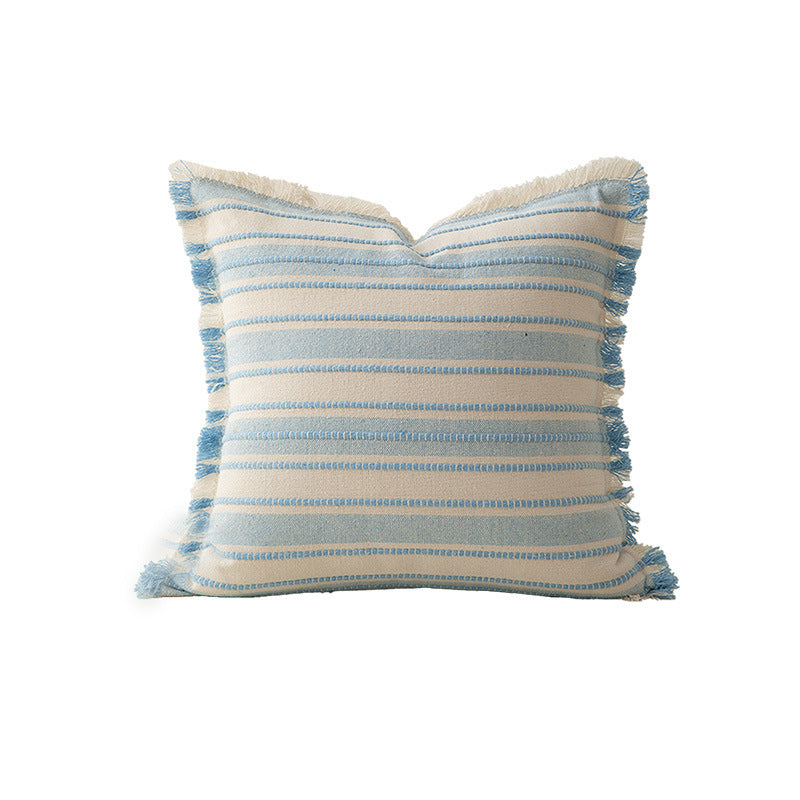 Square cushion cover made of hand-woven cotton blend with decorative fringe trim Kalsten