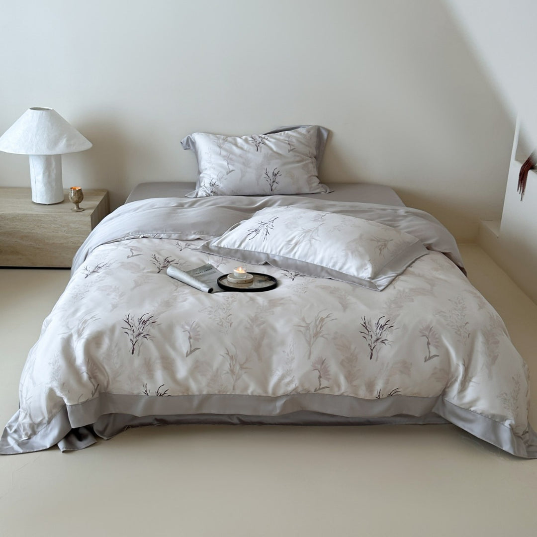 Satin bedding set with floral print and ruffle