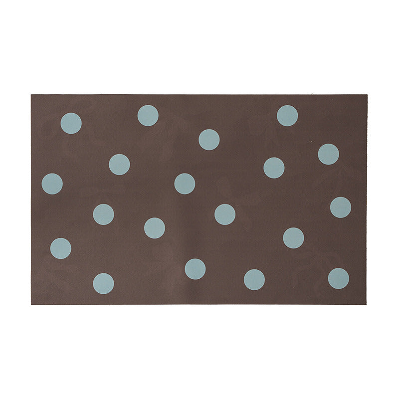 Wipeable placemat made of PVC with large polka dot pattern and non-slip backing Kalsten
