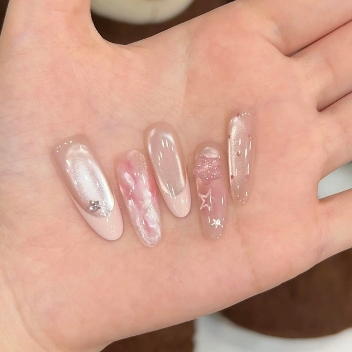 Artificial nails with delicate glitter and star motifs Kalsten