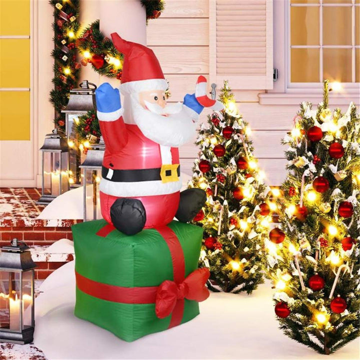 Inflatable Santa Claus decoration figure on gift package