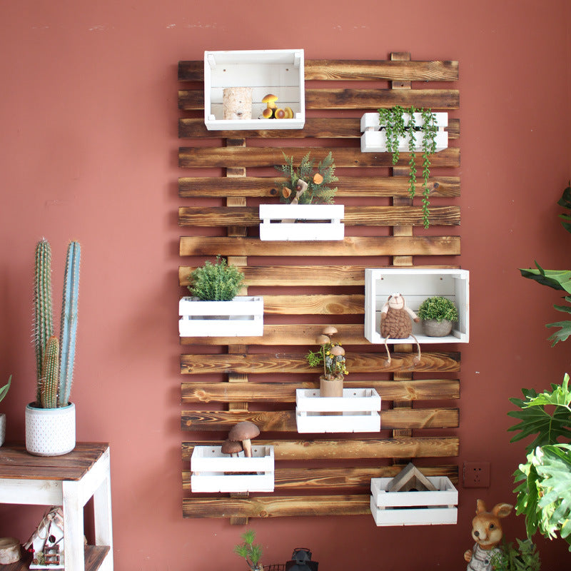 Wall shelf system with integrated storage boxes Kalsten