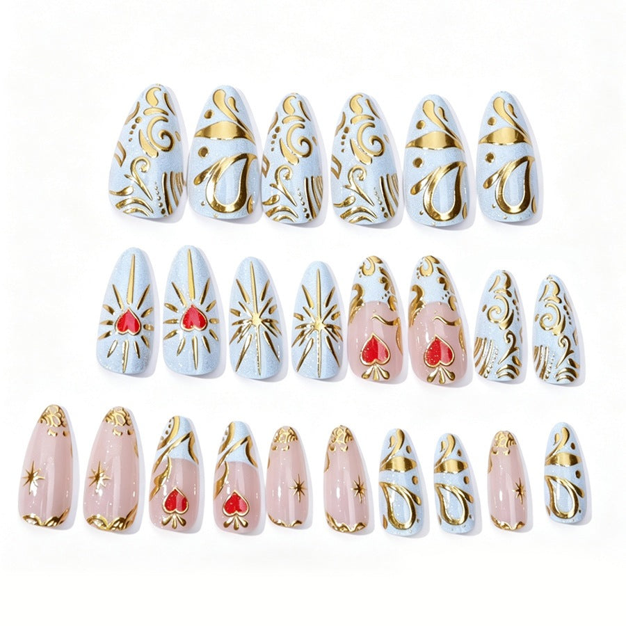 Artificial nail set with filigree golden accents and romantic heart motifs Kalsten