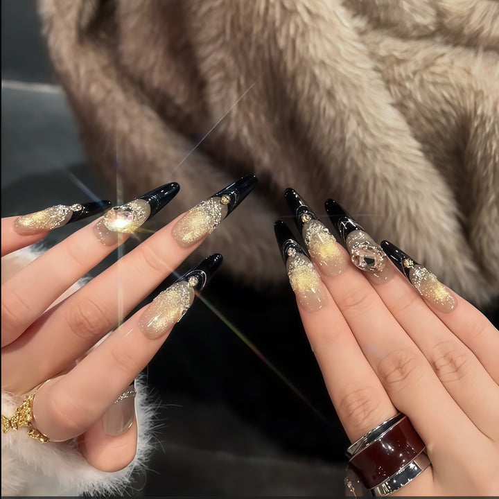 Glamorous artificial nails with extravagant rhinestone and glitter insets Kalsten