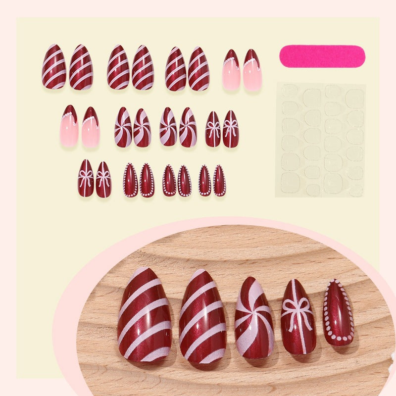 Creative nail art set with festive caramel and stripe designs Kalsten