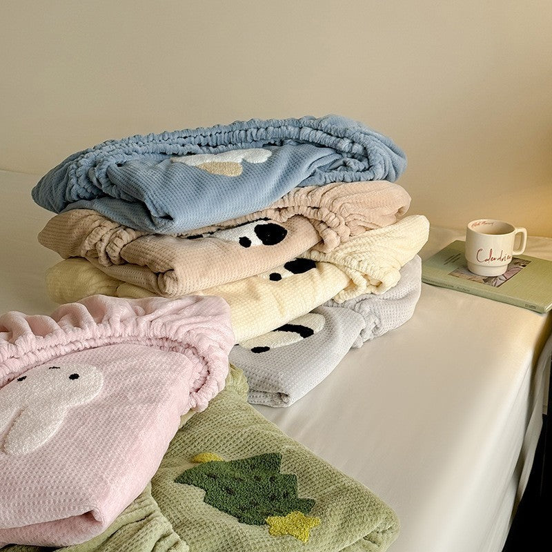 Ribbed fitted sheet set with embroidered Christmas tree applications