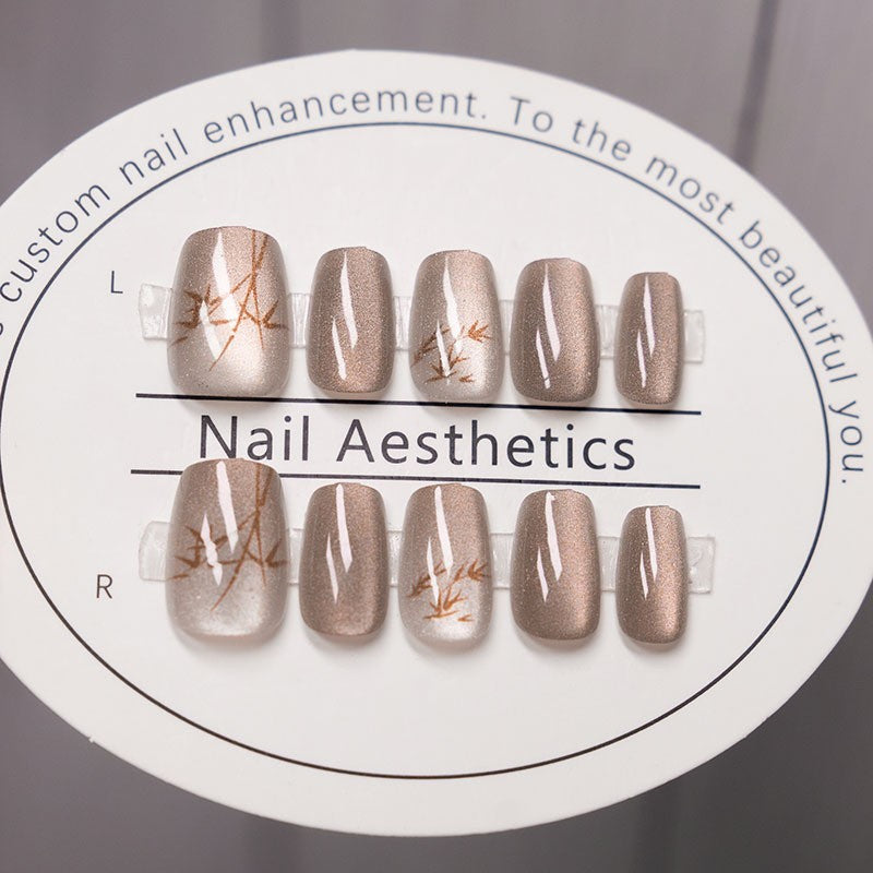 Elegant Press-On Nail Set with Artistic Bamboo Design