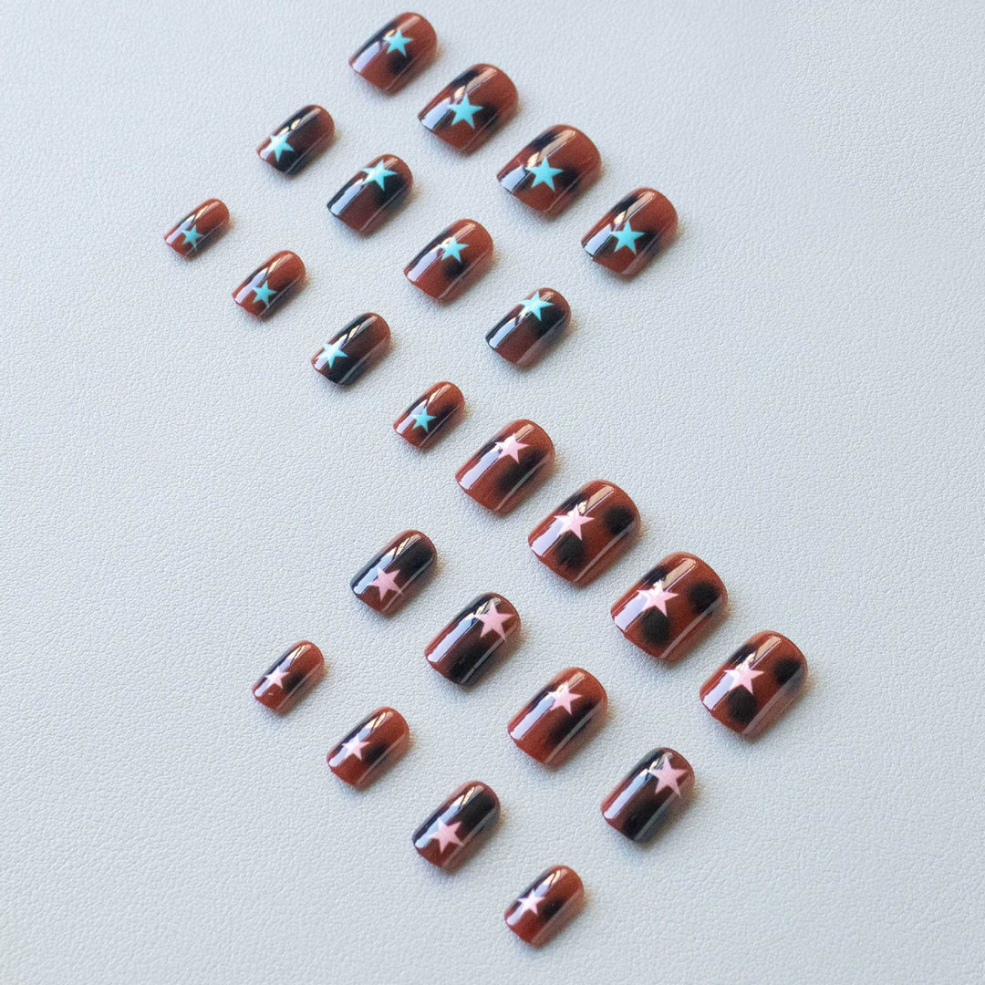 Artistic Star Motif Nail Art