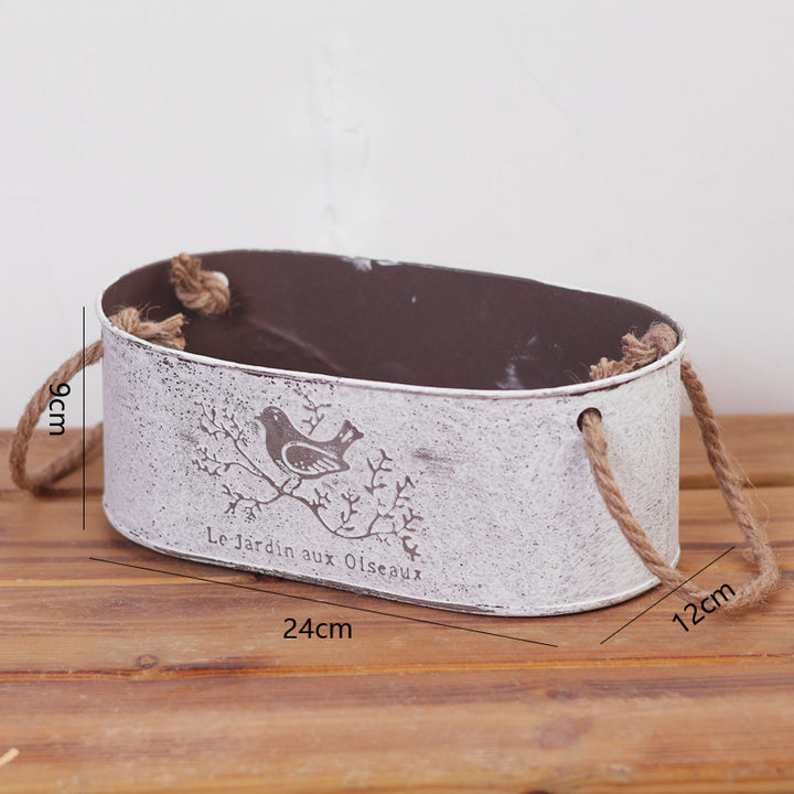Decorative storage basket made of metal with natural design Kalsten