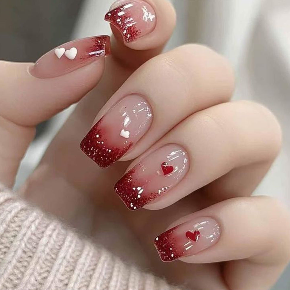 Romantic Nail Art with Heart Motifs Kalsten