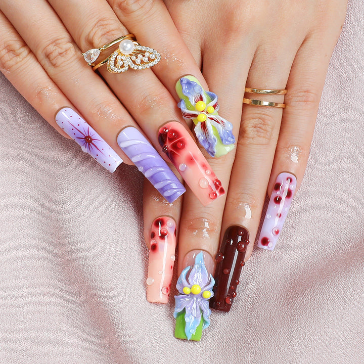 Creative artificial nail set with elegant floral design and glitter accents Kalsten