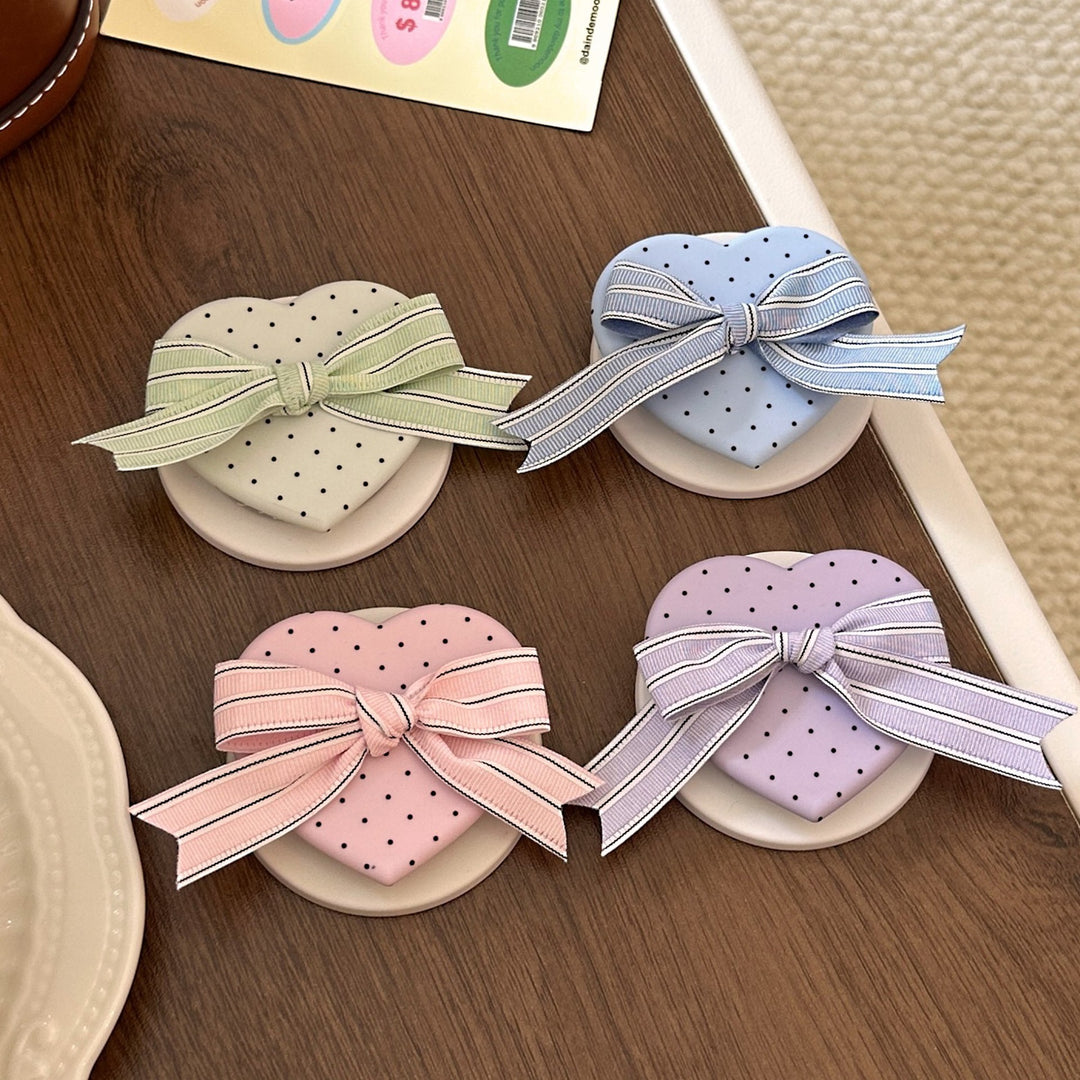 Heart-shaped cosmetic box with bow motif Kalsten