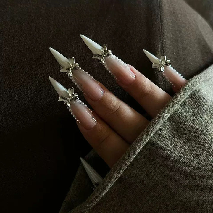 Elegant artificial nail set with 3D rhinestone details and pointed accents Kalsten