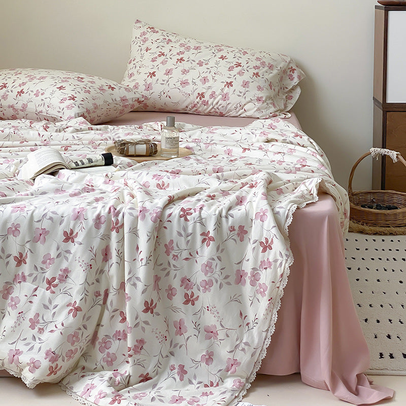 Light cotton gauze bedding set with fine stripe and floral pattern as well as lace edge