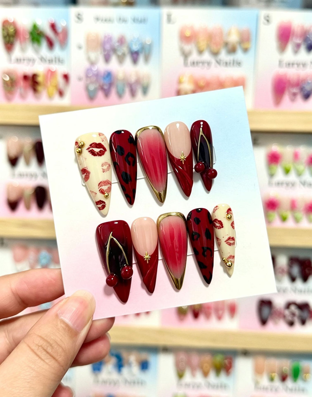 Artistic Press-On Nail Set with Floral and Green Accents
