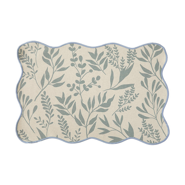Shaped table set with curved contour and botanical leaf pattern Kalsten