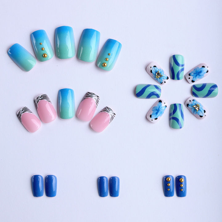 Artificial fingernails with handcrafted designs Kalsten