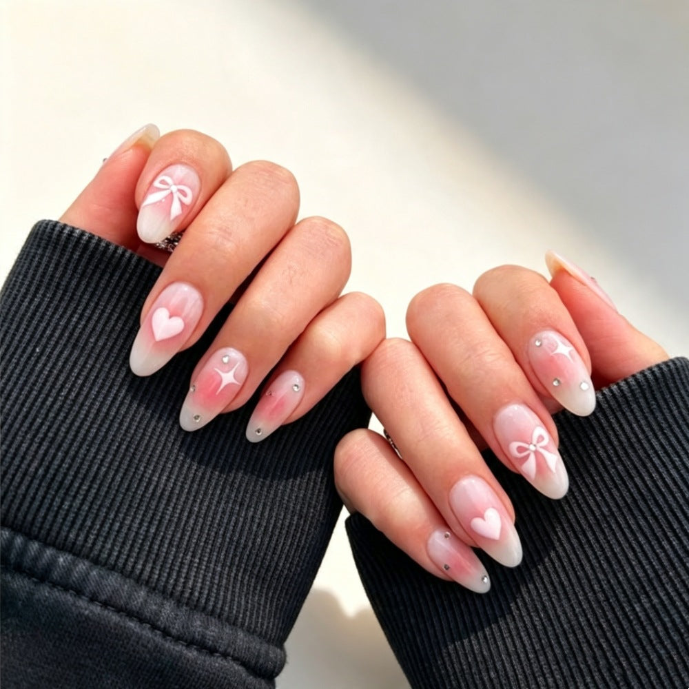 Artificial nails with romantic heart and bow design Kalsten