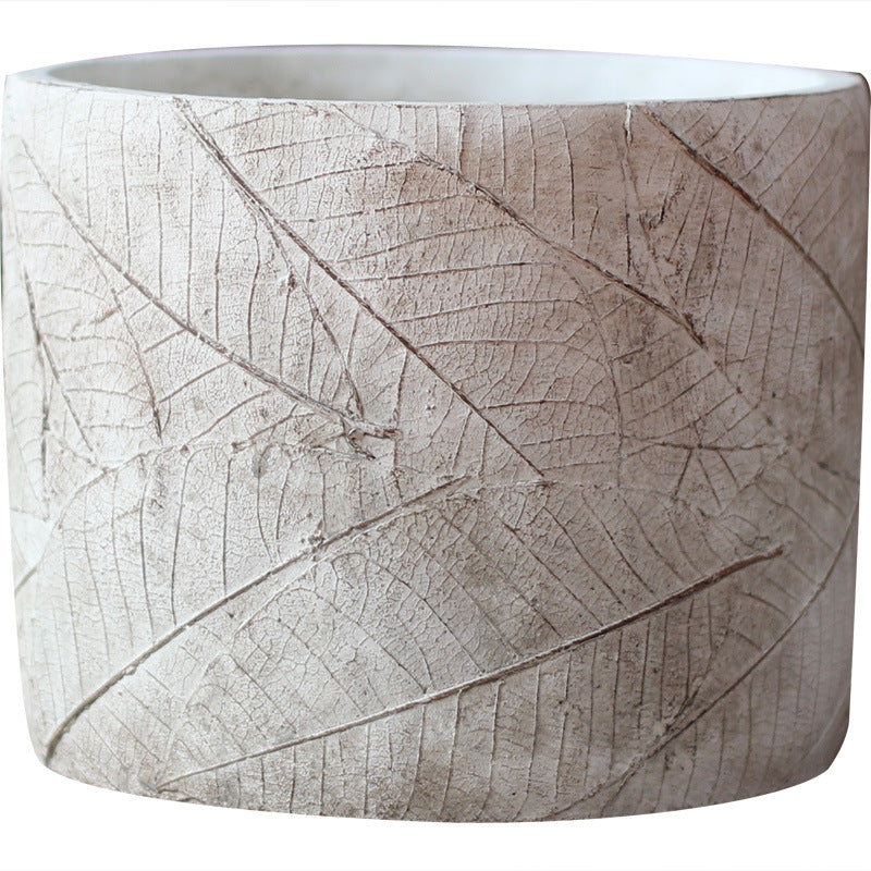 Decorative plant container made of handmade ceramic with leaf pattern Kalsten