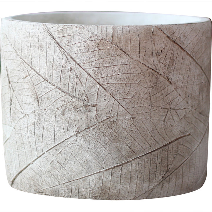 Decorative plant container made of handmade ceramic with leaf pattern Kalsten