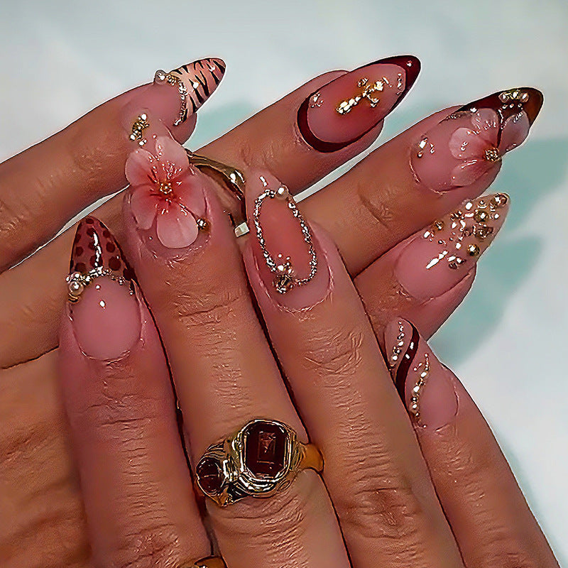 Creative nail art set with floral and glamorous accents Kalsten