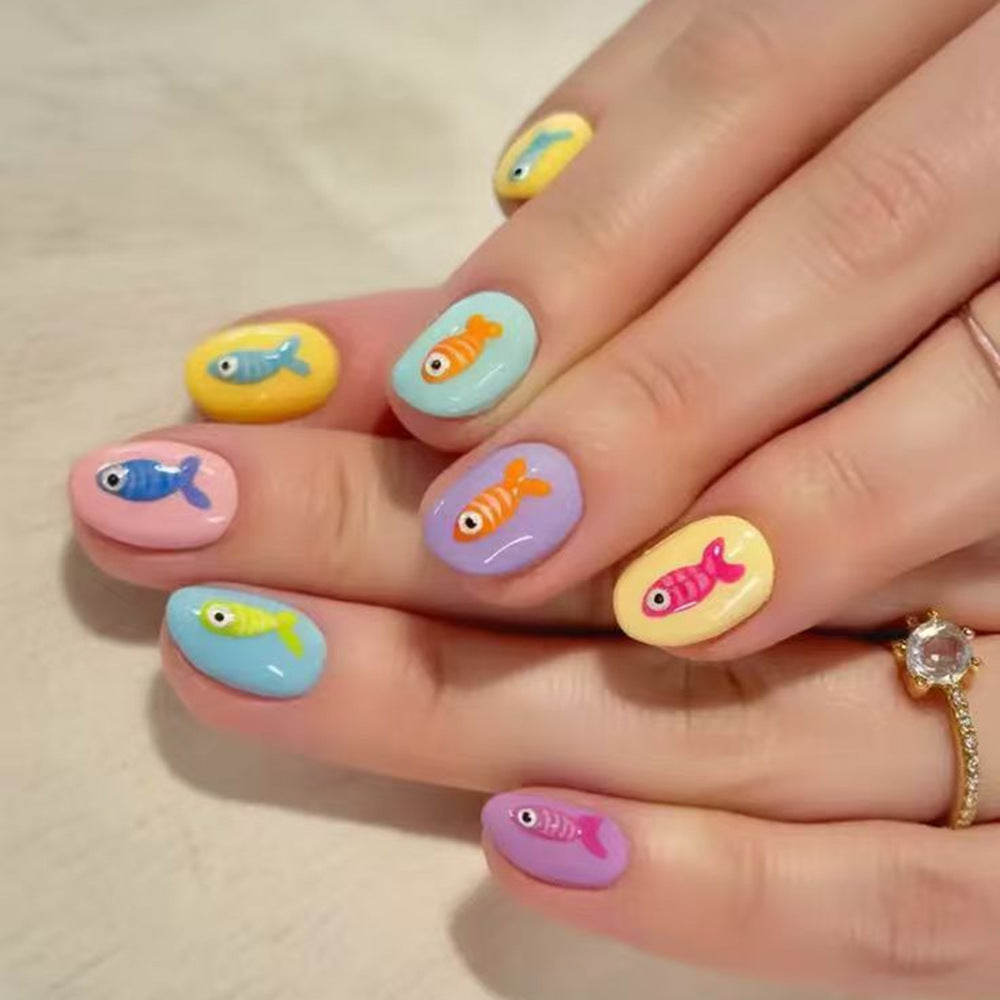 Creative artificial nails with playful fish design Kalsten