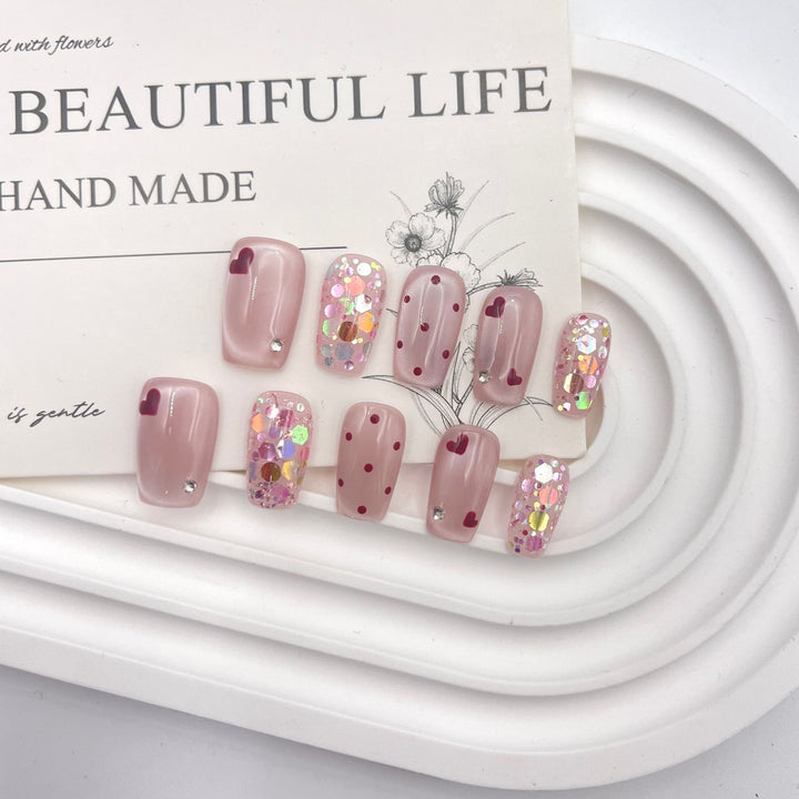 Artistic Press-On Nail Art Set with Heart and Glitter Design