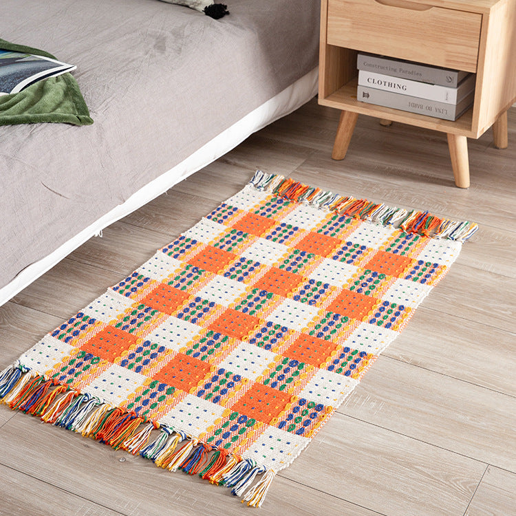 Striped cotton doormat with non-slip bottom and decorative woven edge Kalsten