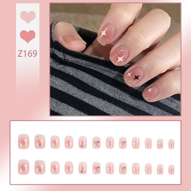 Acrylic nail set with sparkling star decorations and elegant accents Kalsten
