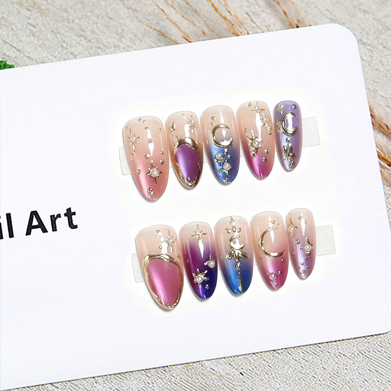 Glamorous artificial nails with star and moon motifs Kalsten
