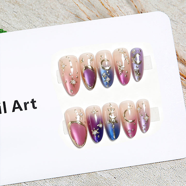 Glamorous artificial nails with star and moon motifs Kalsten