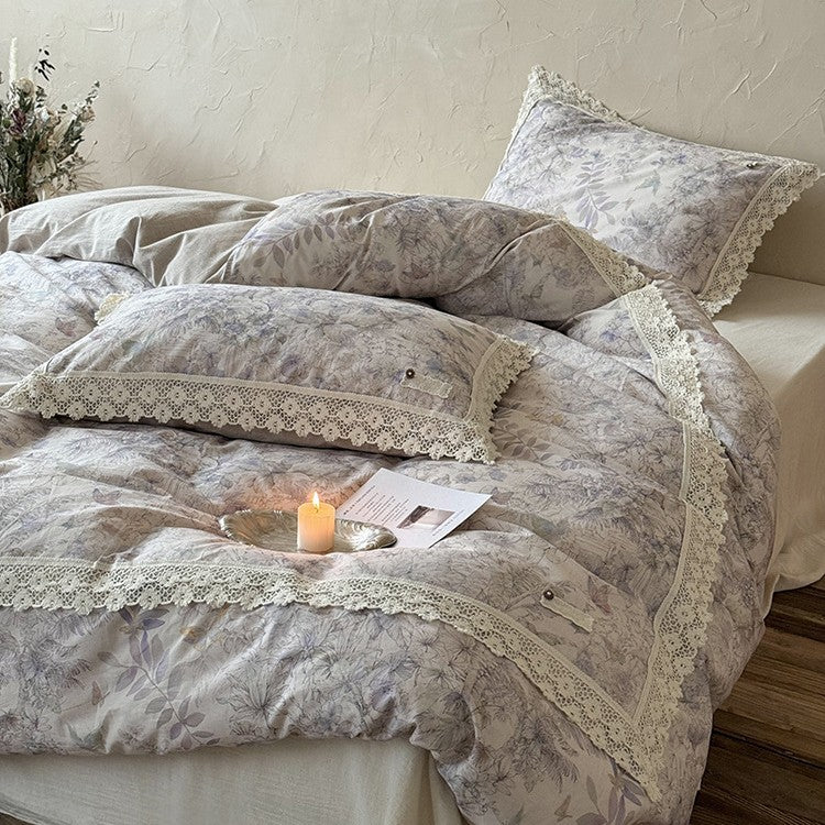 Duvet cover set made of cotton percale with fine lace trim and botanical watercolor pattern