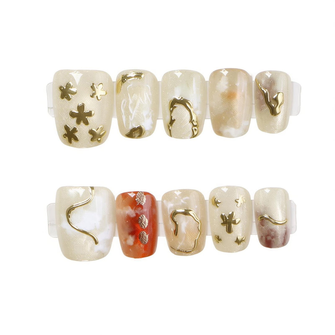 Elegant Press-On Nail Art Set with Unique Metallic Designs Kalsten